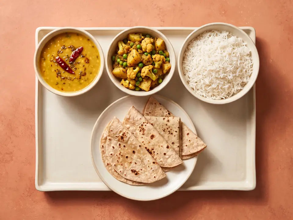 4 rotis with dal and sabzi and rice