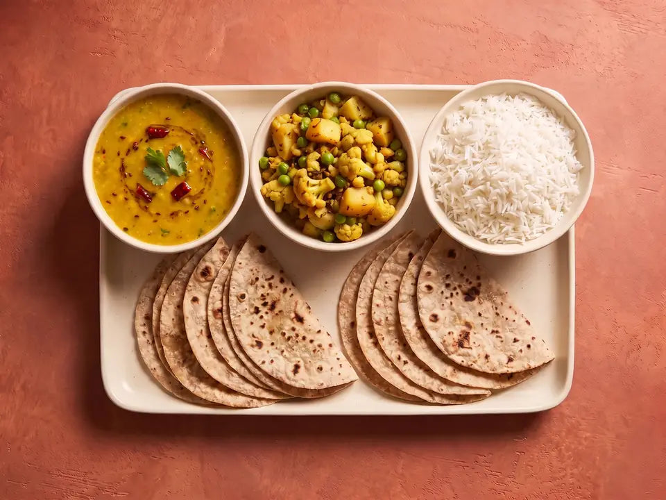 8 rotis with dal and sabzi and rice